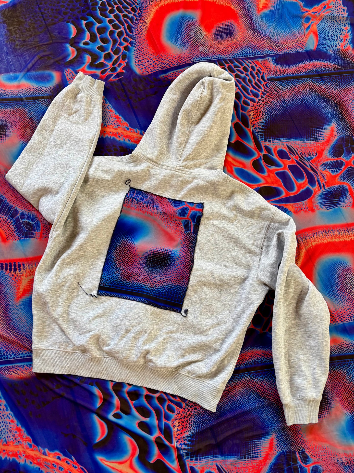 ECHOES OF CORAL HOODIE